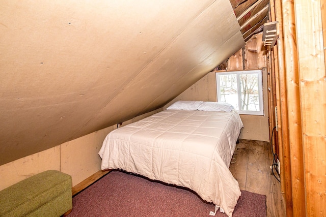 bedroom featuring vaulted ceiling