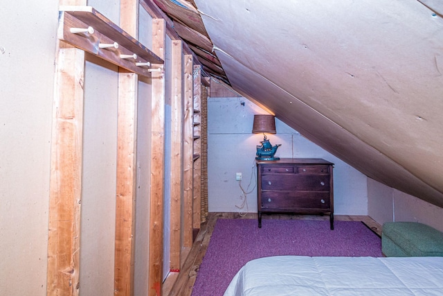 bedroom featuring lofted ceiling