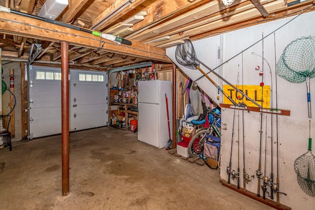 garage with freestanding refrigerator