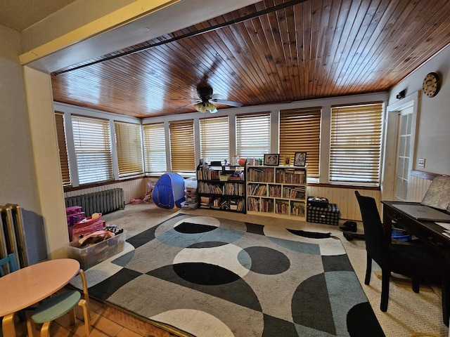 game room featuring wooden ceiling, carpet flooring, and a wealth of natural light