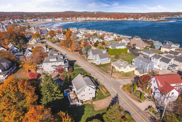 bird's eye view featuring a residential view and a water view