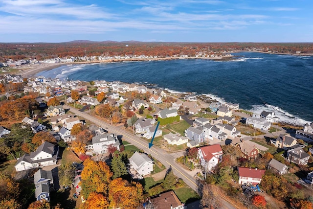 bird's eye view featuring a water view and a residential view