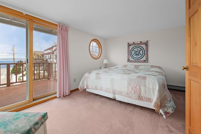 carpeted bedroom with access to outside, baseboards, and baseboard heating