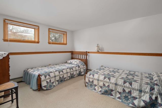 bedroom featuring carpet flooring and baseboard heating