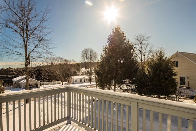 view of snow covered deck