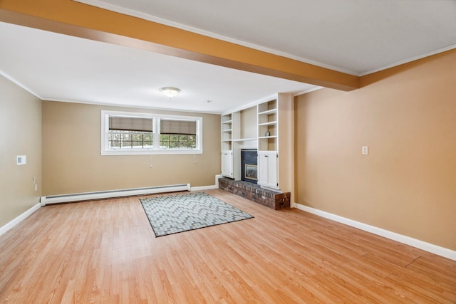 unfurnished living room with a baseboard heating unit, light wood finished floors, a brick fireplace, and baseboards