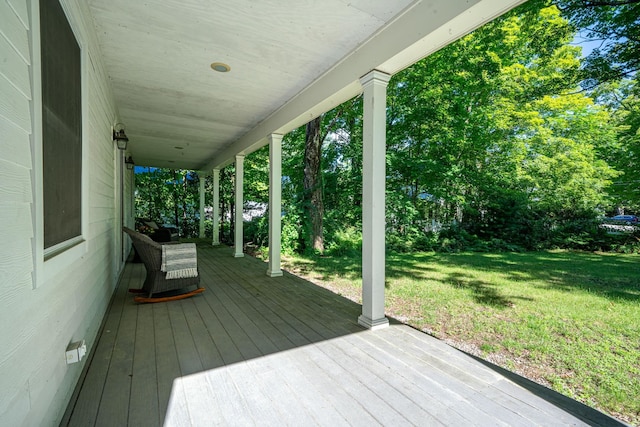 deck featuring a lawn