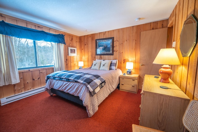 carpeted bedroom featuring wooden walls and baseboard heating