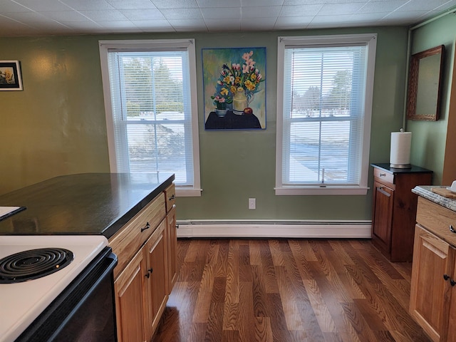 kitchen featuring brown cabinetry, electric range, baseboard heating, and dark wood-style flooring