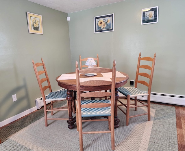 dining room with baseboards