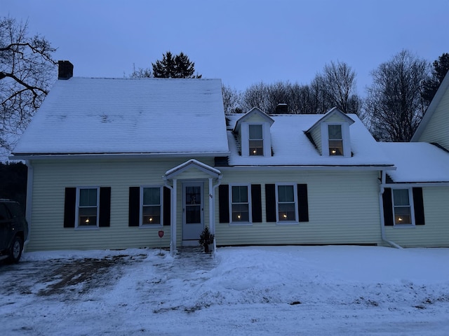 view of new england style home