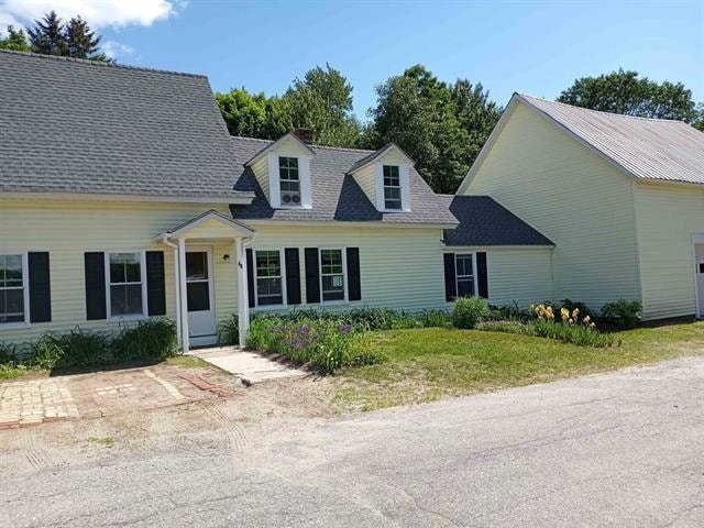 view of cape cod-style house