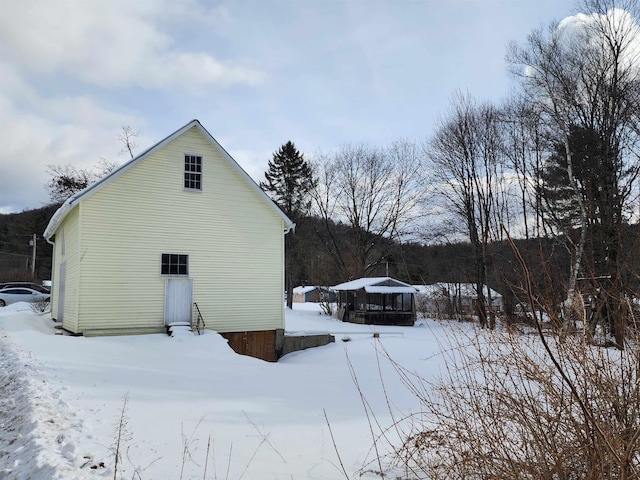 view of snow covered property