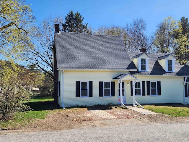 40 Ellis Ln, Claremont, NH 03743 - cape cod-style house with a chimney