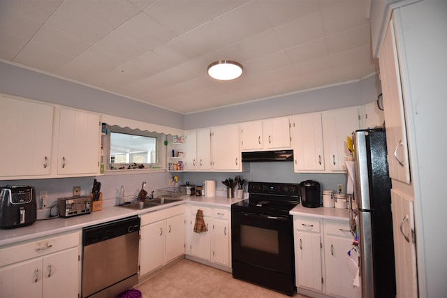 kitchen featuring stainless steel appliances, light countertops, white cabinetry, a sink, and under cabinet range hood