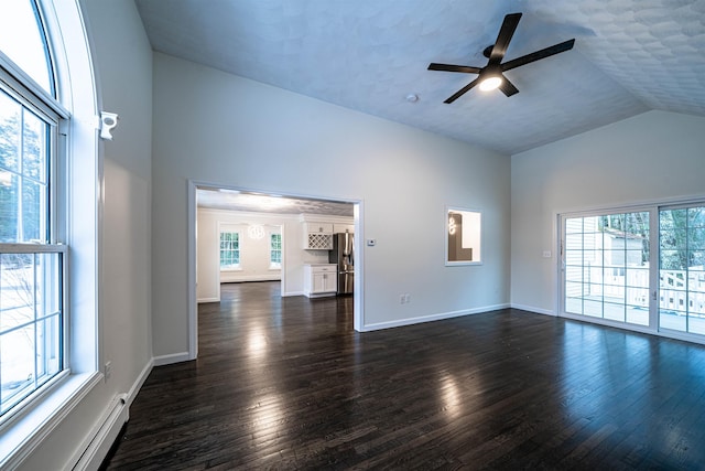 unfurnished living room with high vaulted ceiling, dark wood-type flooring, baseboard heating, and baseboards