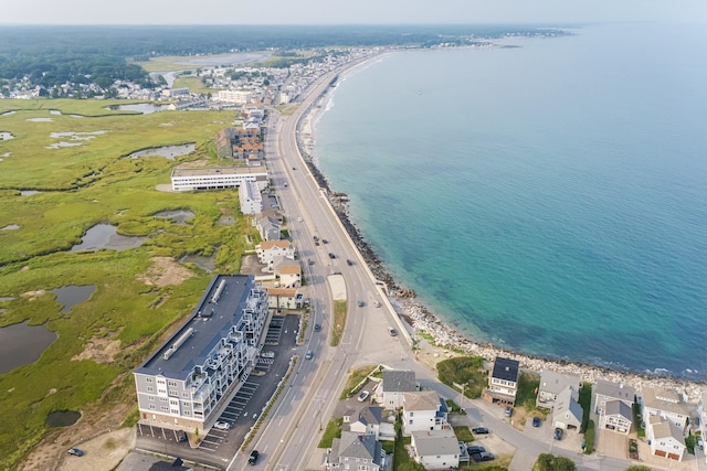 aerial view featuring a water view and a view of the beach