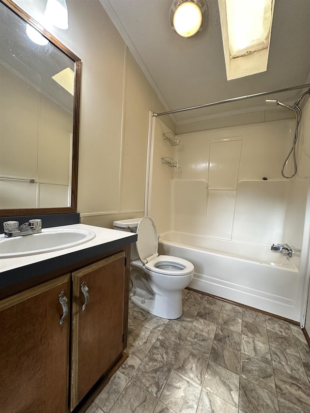 full bath with a decorative wall, toilet, ornamental molding, vanity, and shower / tub combination