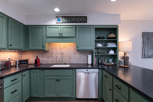 kitchen featuring green cabinetry, a sink, and stainless steel dishwasher