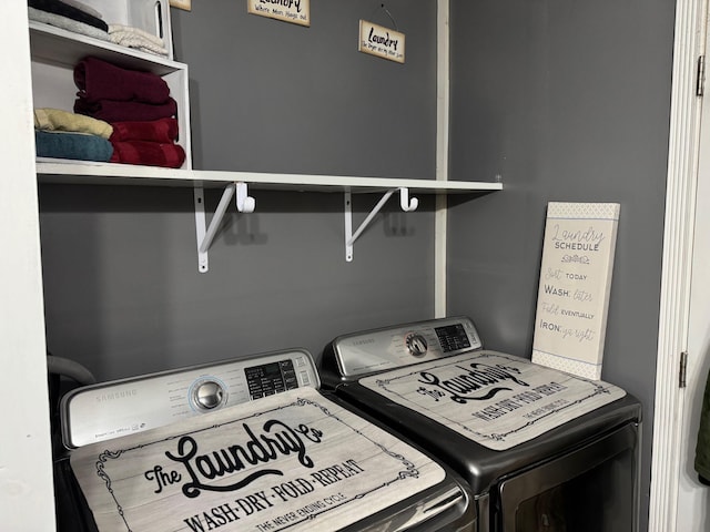 laundry area with laundry area and separate washer and dryer