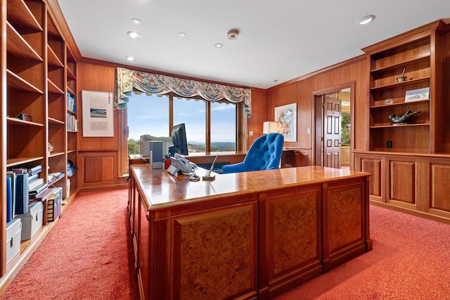 home office with light carpet, ornamental molding, and a wealth of natural light