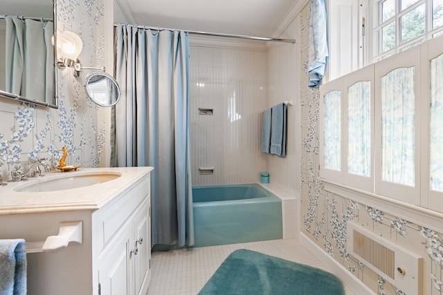 bathroom featuring a wealth of natural light, tile patterned flooring, shower / bath combo with shower curtain, and wallpapered walls