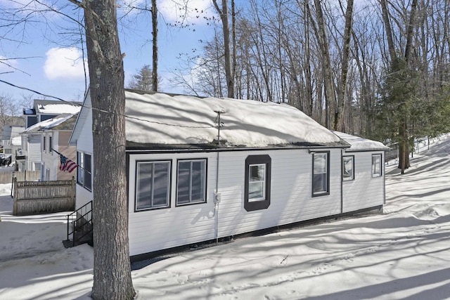 view of snow covered property