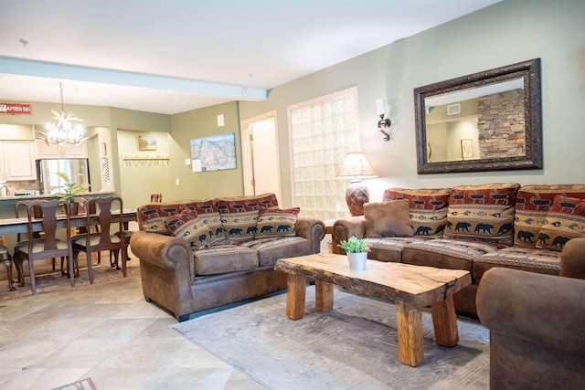 living area featuring a chandelier