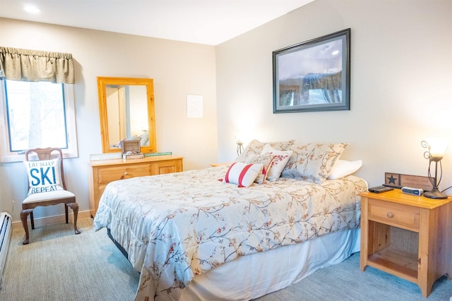 bedroom featuring carpet flooring and baseboards