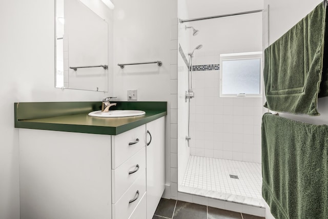 bathroom with a stall shower and vanity