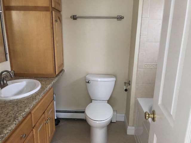 full bathroom with baseboards, toilet, a baseboard radiator, tile patterned floors, and vanity