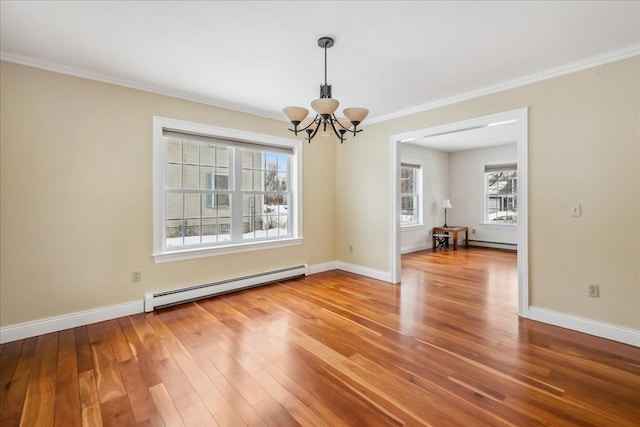 unfurnished dining area with a baseboard radiator, a notable chandelier, baseboards, and wood finished floors