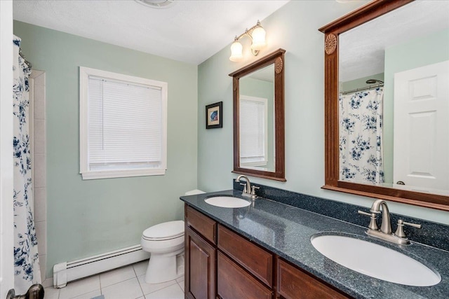 bathroom featuring a baseboard heating unit, a sink, toilet, and tile patterned floors