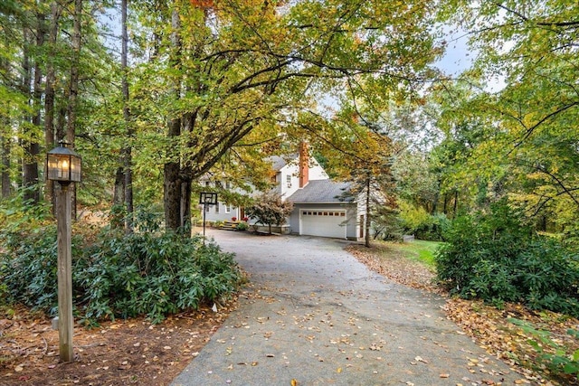 view of front of property featuring a garage and driveway