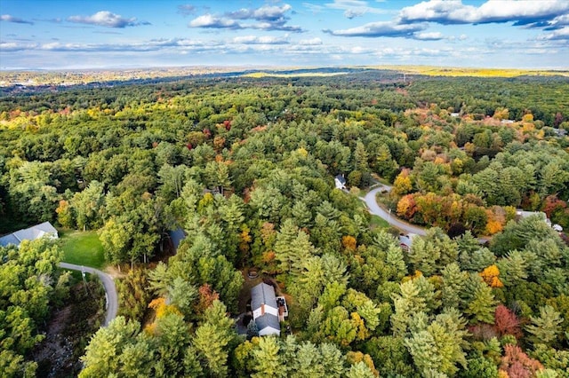 birds eye view of property with a forest view