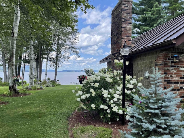 view of yard with a water view