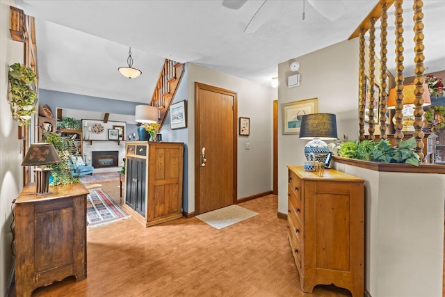 interior space featuring stairway and baseboards