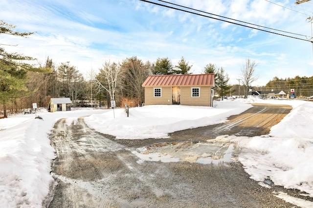 exterior space with an outbuilding