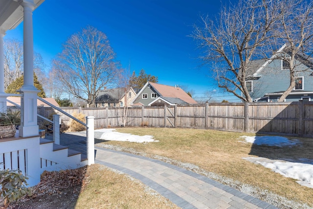 view of yard with a fenced backyard