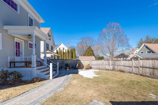 view of yard with a fenced backyard