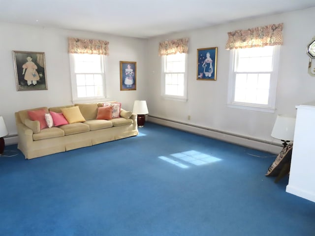 living room with carpet, baseboard heating, a baseboard radiator, and a wealth of natural light