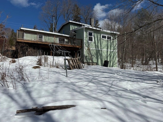 exterior space featuring a wooden deck