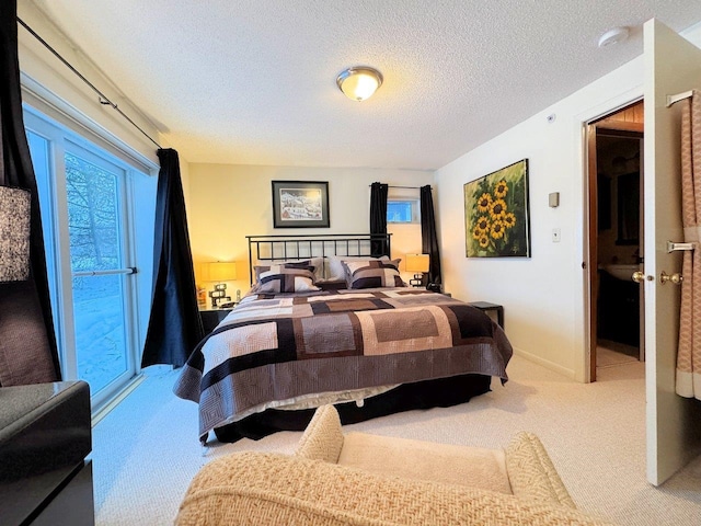 bedroom with a textured ceiling, multiple windows, carpet flooring, and baseboards