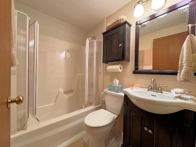 bathroom with washtub / shower combination, toilet, a textured ceiling, and vanity