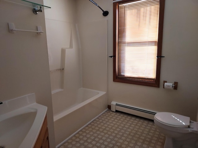 bathroom with a baseboard radiator, toilet, tub / shower combination, vanity, and tile patterned floors