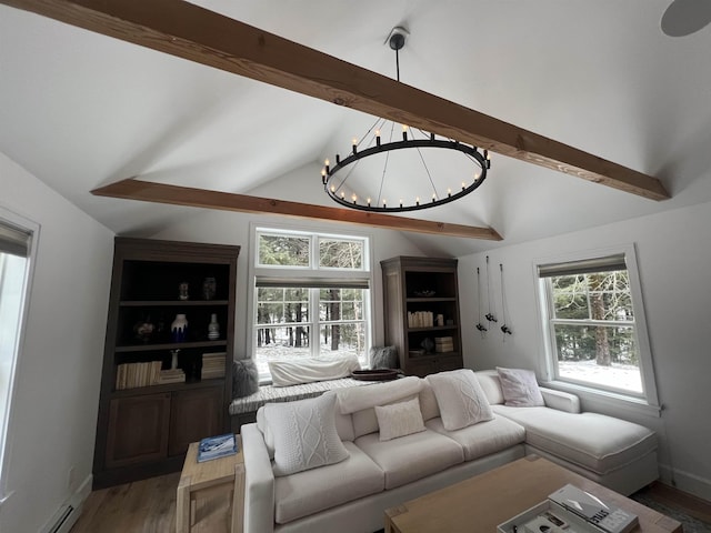 living area with a baseboard radiator, a notable chandelier, a healthy amount of sunlight, and vaulted ceiling with beams