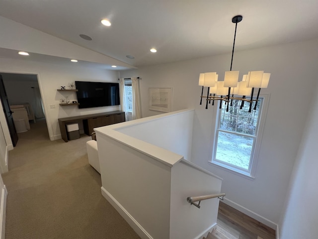 corridor featuring an upstairs landing, recessed lighting, baseboards, and vaulted ceiling