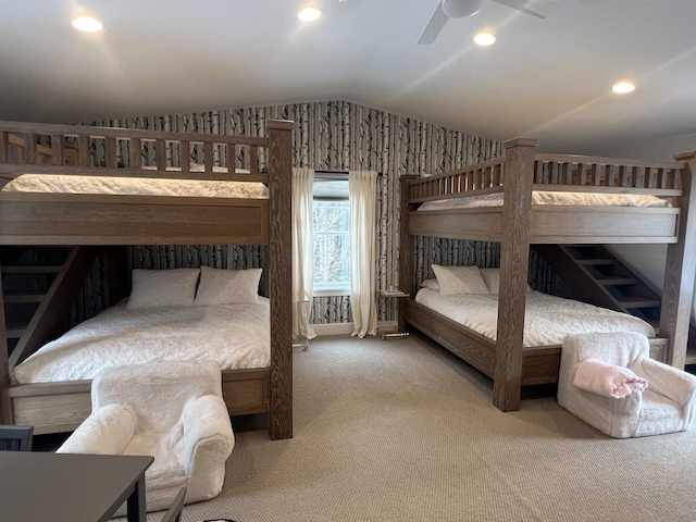 carpeted bedroom featuring recessed lighting and lofted ceiling