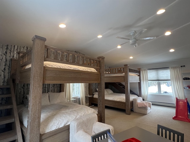 carpeted bedroom with ceiling fan, lofted ceiling, recessed lighting, and a baseboard radiator