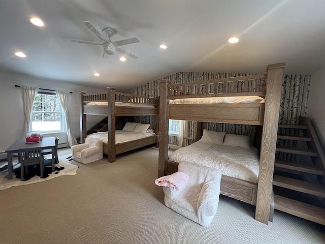 carpeted bedroom featuring recessed lighting, lofted ceiling, and ceiling fan